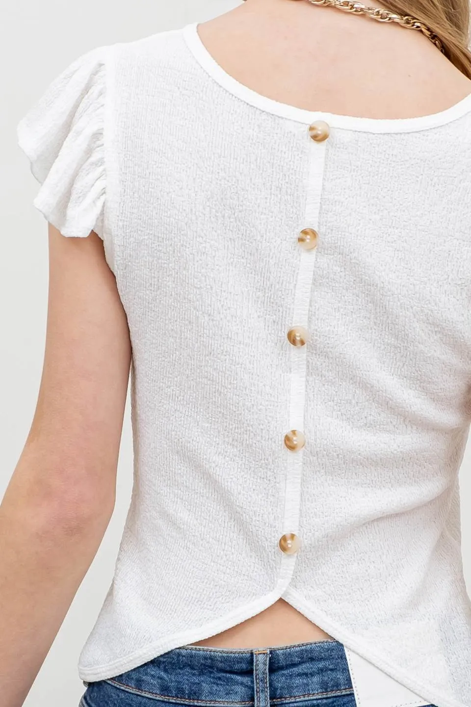 BACK BUTTON SPLICE KNIT TOP