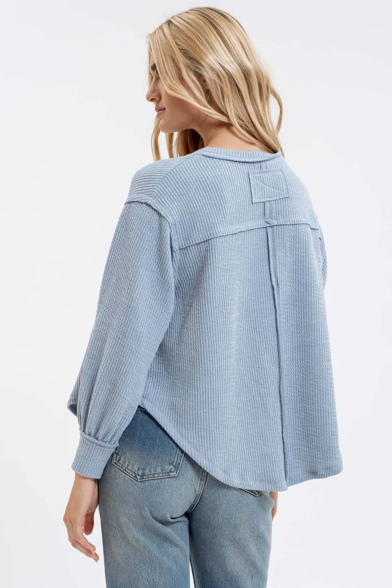 V NECK ASYMMETRICAL HEM LONG SLEEVE KNIT TOP