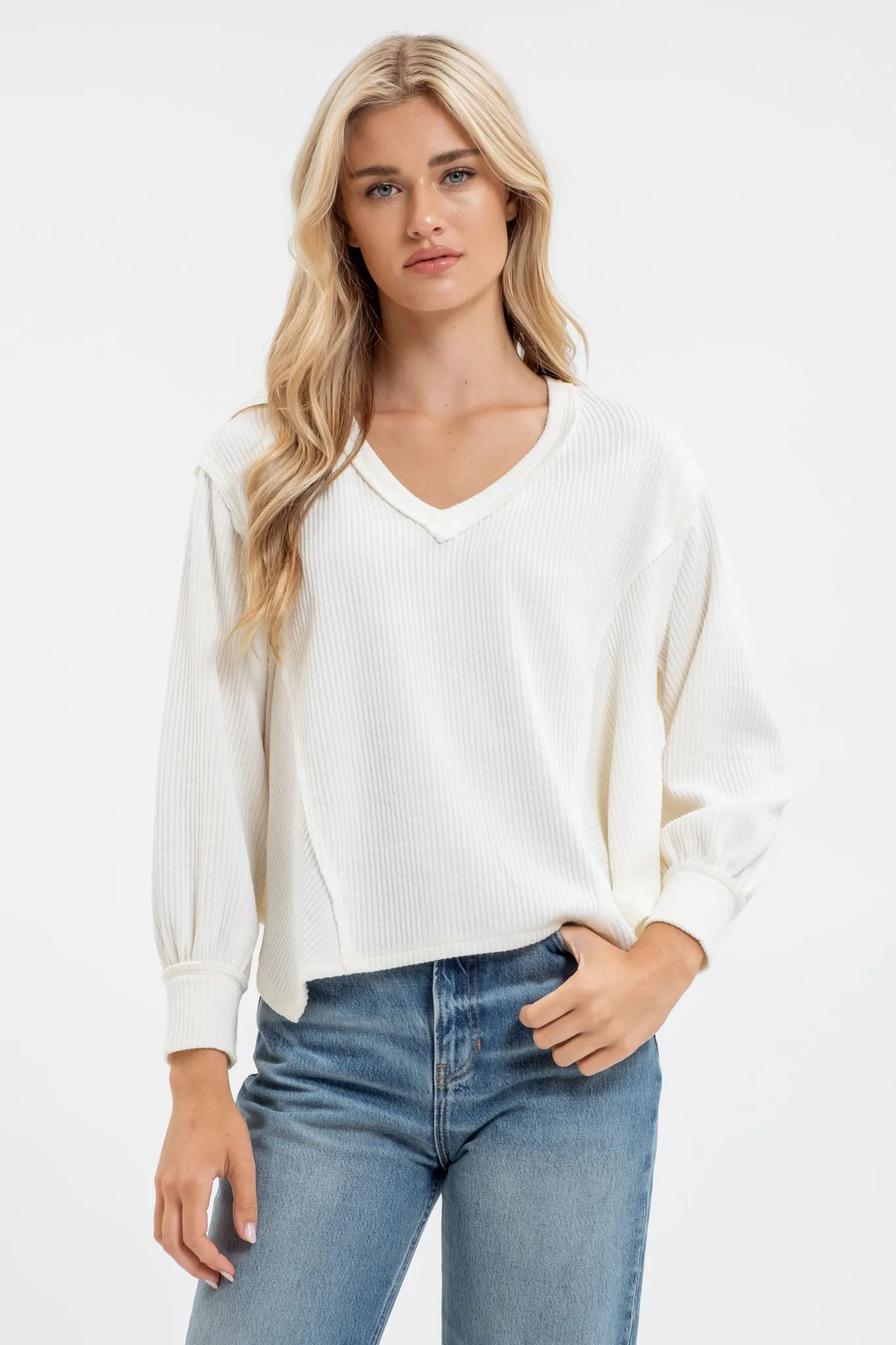 V NECK ASYMMETRICAL HEM LONG SLEEVE KNIT TOP