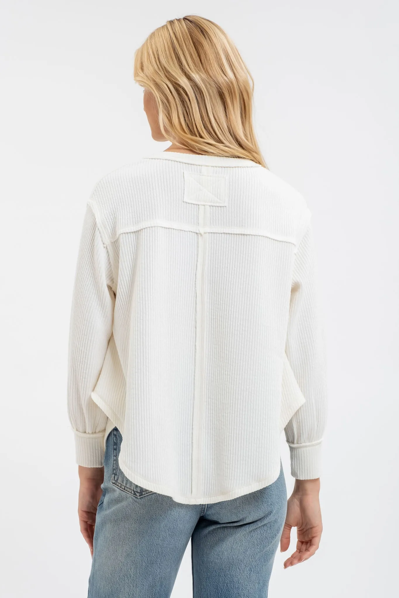 V NECK ASYMMETRICAL HEM LONG SLEEVE KNIT TOP